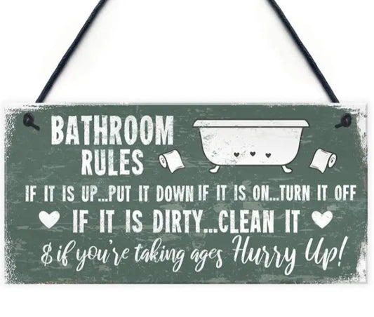 Bathroom rules hanging